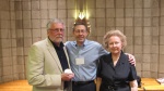 Author, left, receives his 2014 Seymour Medal at the NINE Conference banquet with Marc Appleman, center, and Dorothy Seymour Mills